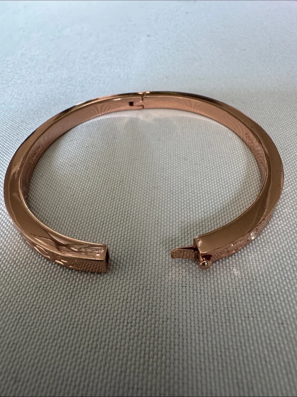 Coach Rose Gold-Tone Hinged Logo Bangle with Crystal Accents
